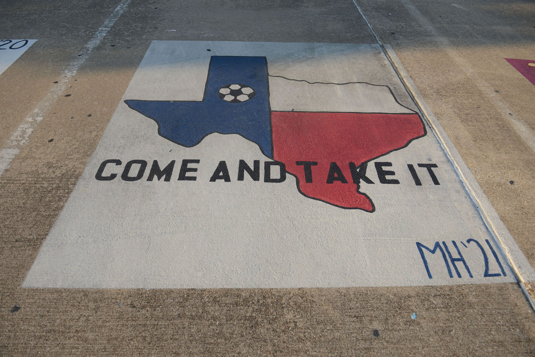 A&M Consolidated HS painted parking spots